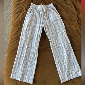 Black and white bathing suit cover up wide legged pants.